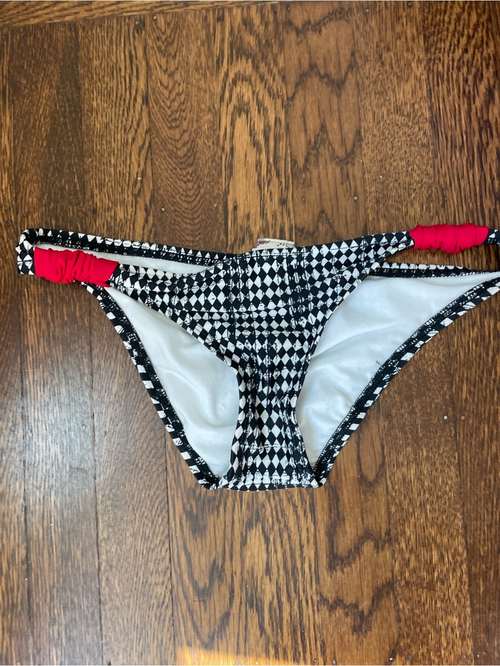 EUC! Rip Curl Black & White Diamond Bikini Bottom with RED Side Accents